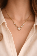 Elegant Gold-Plated Designer Chain Necklace with Crystal Accents and Clover Pendant
