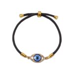 black adjustable bracelet with a blue evil eye  charm set in a gold-tone frame - Image 7