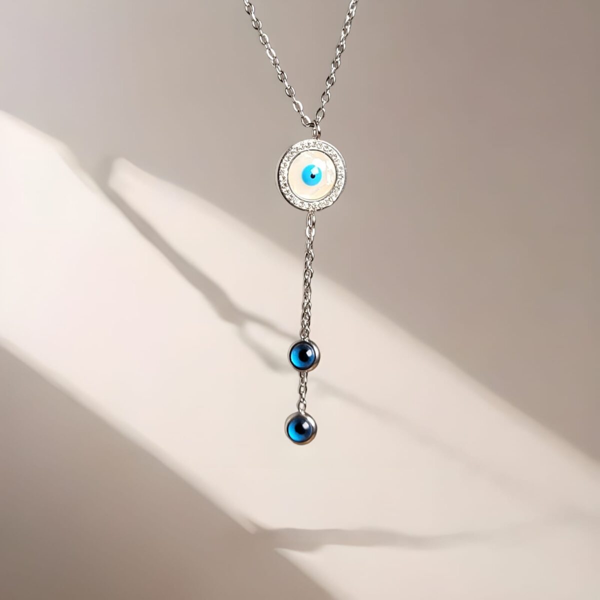 Stylish Silver Evil Eye Pendant Necklace for Women – Triple Charm Design - Image 2