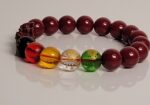 multi-color Feng Shui / spiritual beaded bracelet with red,  yellow, green, and clear beads along with carved dragon/Pi Xiu details