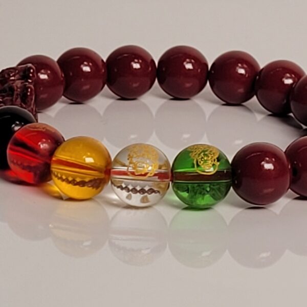 multi-color Feng Shui / spiritual beaded bracelet with red,  yellow, green, and clear beads along with carved dragon/Pi Xiu details