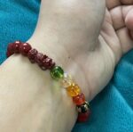 multi-color Feng Shui / spiritual beaded bracelet with red,  yellow, green, and clear beads along with carved dragon/Pi Xiu details - Image 5