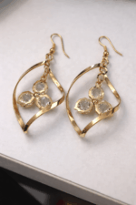 Crystal Glow Elegant Gold-Tone Twisted Teardrop Crystal Drop Earrings - Image 2
